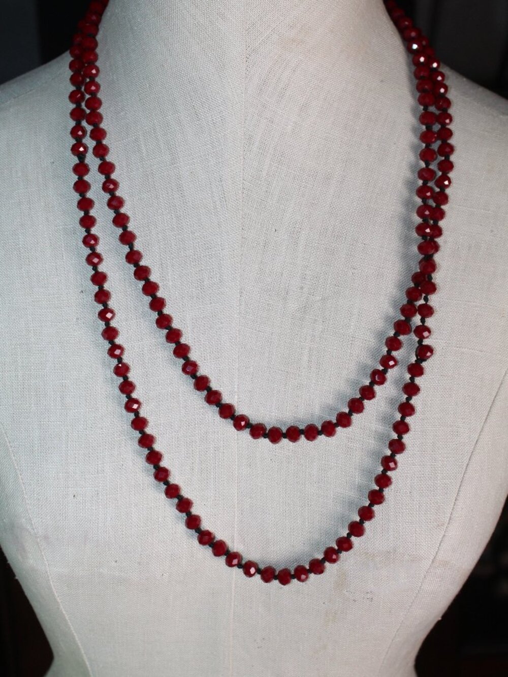 Long Red Faceted Beads on 56" Black Hand-Knotted Strand Necklace